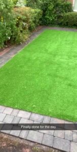 Close-up of artificial grass highlighting its realistic texture and color.